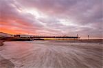 Dramatic skies over Herne Bay Pier at dusk, Herne Bay, Kent, England, United Kingdom, Europe