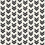 Hand drawn style ethnic seamless pattern. Abstract grungy geometric shapes background in black and white.