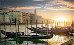 Gondolas and architecture in Venice at sunset, Italy