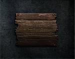 3D render of a old wood sign on a grunge stone texture background