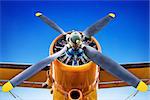 propeller of an historic airplane against a blue sky