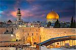 Cityscape image of Jerusalem, Israel with Dome of the Rock and Western Wall at sunset.