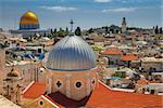 Cityscape image of old town Jerusalem, Israel with the Church of St. Mary of agony and the Dome of the Rock