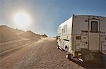 Campervan parked on desert dirt track, San Pedro de Atacama, Chile