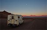 Campervan in Valle de la Luna at sunset, San Pedro, Atacama, Chile