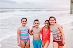 Portrait of boy and three girls on beach, Dauphin Island, Alabama, USA