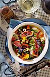 Colourful minestrone with red mullet and edible flowers