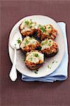 Baked portobello mushrooms stuffed with meat and cheese