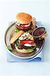 Burgers with grilled portobello mushroom, mozzarella, bacon, tomato and courgette