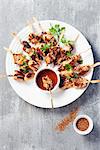 Spicy chicken kebabs with a dip
