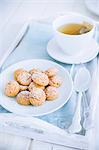 Amaretti biscuits and a teacup