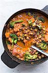 Chickpea and butternut squash curry in a cooking pot