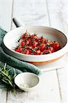 Roasted tomatoes with salt in a baking dish