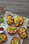 Crostini with pumkin ricotta, roasted pears, blue cheese and rucola