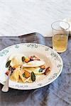 Roasted pumpkin and ricotta ravioli with sage, butter and parmesan cheese