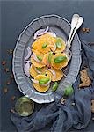 Orange salad with red onions and basil