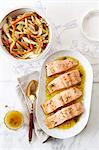 Poached salmon fillets and spring vegetables