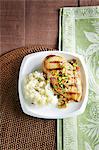 Grilled chicken breast with avocado salsa and mashed potato