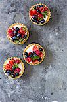 Mixed berry tarts with vanilla cream