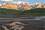 River coming from Kel-Suu mountain range at sunset, Kurumduk valley, Naryn province, Kyrgyzstan, Central Asia, Asia