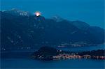 Moon on Lake Como and Mount Grigna from church San Martino, Griante, Como province, Lombardy, Italy, Europe.