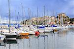 Capodimonte tourist port with black clouds in the sky. Capodimonte, Bolsena Lake, Viterbo province, Lazio, Italy