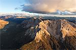 Aerial view of the rocky peaks of Latemar at sunset, Dolomites, South Tyrol, Italy