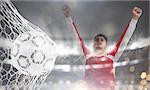 Double exposure image with a ball pierces the soccer goal at the stadium during a night match and a soccer player who is exulting. 3D Rendering