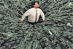 Businessman swallowed by a big black hole of money. Concept of failure and economic crisis
