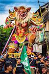 Procession of Ogoh-ogoh statue in the Ngrupuk Parade on the eve of Nyepi Day in Ubud in Gianyar, Bali, Indonesia