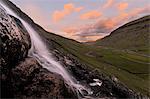 Waterfall at sunset, Saksun, Streymoy Island, Faroe Islands, Denmark, Europe