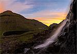 Panoramic of waterfall at sunset, Saksun, Streymoy Island, Faroe Islands, Denmark, Europe