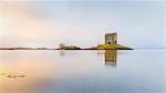 Castle Stalker on its own island in Loch Linnhe surrounded by mist, Argyll, Scottish Highlands, Scotland, United Kingdom, Europe