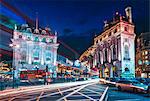 Traffic trails and festive Christmas lights at night, Piccadilly Circus, London, England, United Kingdom, Europe