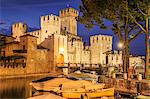 View of Scaliger Castle illuminated at night, Sirmione, Lake Garda, Lombardy, Italian Lakes, Italy, Europe