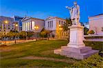 View of the statue and National Library of Greece at dusk, Athens, Greece, Europe