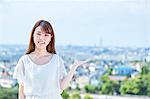 Attractive Japanese woman in a city park