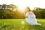 Attractive Japanese woman in a city park