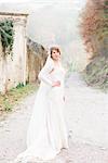 Portrait of bride on country lane