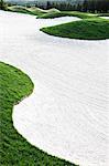 Closeup view of a fairway sand trap on a golf course