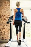 Woman exercising on treadmill