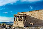 The Porch of the Caryatids at the Erechtheion temple on the Acropolis, Athens, Greece. Six columns sculpted as figures of maidens in place of ordinary columns.