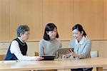 Digital tablet lessons for senior people