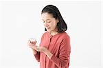 Senior woman taking medicine