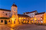 Clock tower of the City Loggia of Trogir at dawn, Croatia, Europe