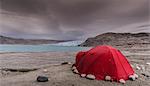 Red tent pitched in front of Qualerallit glacier, Narsaq, Kitaa, Greenland