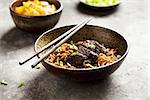 Asian noodle dish with beef and green onion