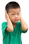 Asian child covering his ears with hands. Portrait of young boy isolated on white background.