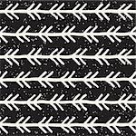 Hand drawn style ethnic seamless pattern. Abstract grungy geometric shapes background in black and white.