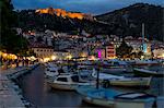 The port of Hvar Town and the Spanish Fortress at dusk, Hvar, Croatia, Europe